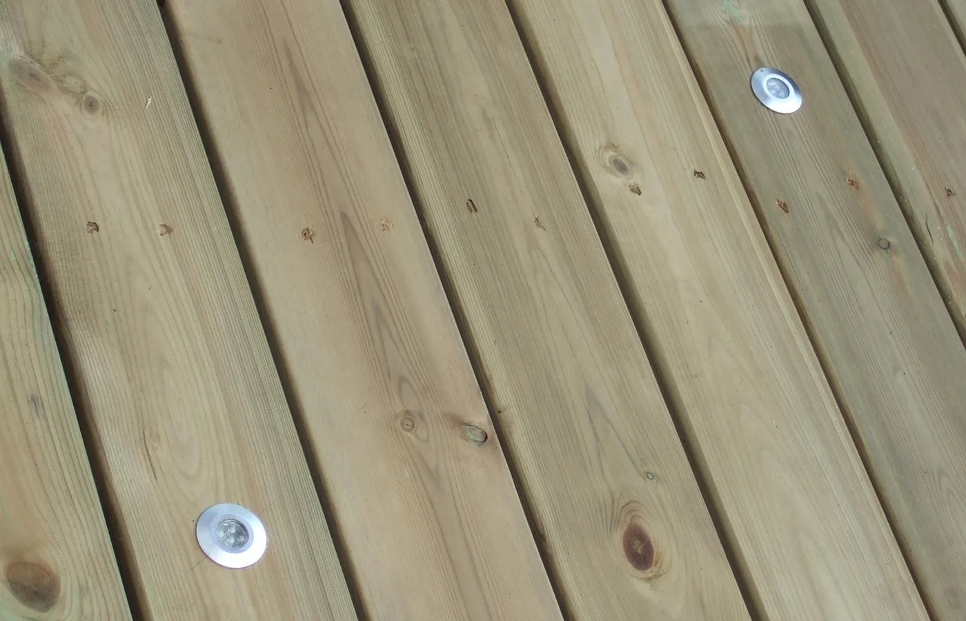 Clean pale timber decking boards after washing